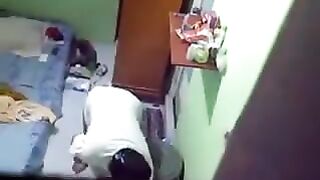Spy camera in the room of a girl in the hostel