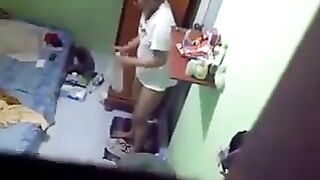 Spy camera in the room of a girl in the hostel