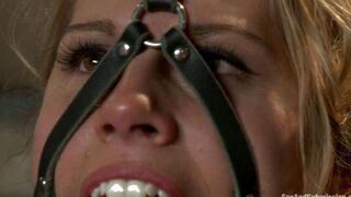 A woman is tied up and humiliated by her master