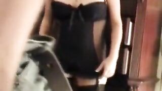 A sexy brunette wife wearing a corset gets fucked on the bed