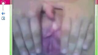 A girl has sex right next to the webcam and shows her big pussy