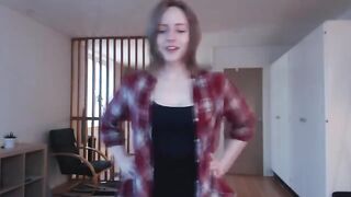 The girl plays with a big dildo and imitates intercourse with her wet pussy