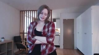 The girl plays with a big dildo and imitates intercourse with her wet pussy