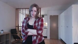 The girl plays with a big dildo and imitates intercourse with her wet pussy