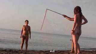 Nude beauty playing on the beach in HD quality
