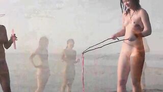 Nude beauty playing on the beach in HD quality