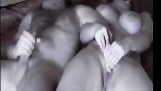 A fat woman was fucking on the bed, not knowing she was being watched