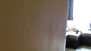 Spying for his sister and her boyfriend on the couch