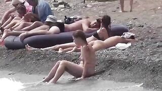 A couple of free love on the beach without any clothes