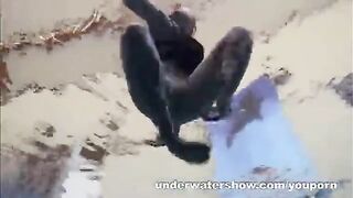 A girl is fucking in the pool without any clothes on her body