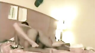 A girl has sex and spreads her legs on the bed at home