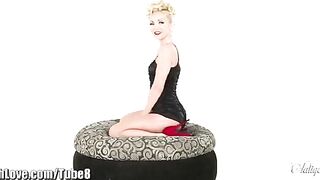 A whip on the fifth point of a white beauty, who wears high heels