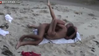 A real hidden shooting on the beach with a girl naked