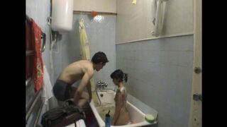 A girl has sex with her brother in the bathroom, hidden camera on