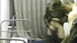 A random chick is having fun with soldiers in the barracks