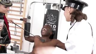 A negro guy is having fun with two girls in latex