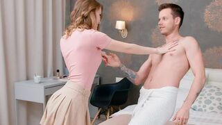 A couple has a passionate conversation while lying on the bed completely naked