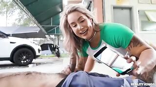 The girl is having sex with the mechanic after he cleaned her car