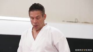 A girl is having sex with her coach in an uncomfortable pose