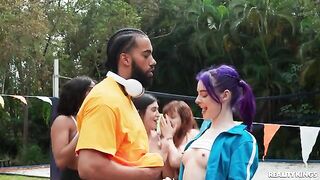 A young guy has fun with a pretty girl in the nature