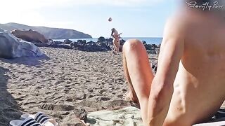 Two hot girls got caught by a guy wanking on the nude beach