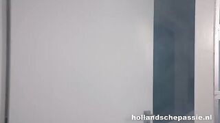 Two Dutch girls are having fun according to old traditions