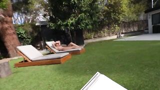 A couple enjoys passionate sex right in their summer house garden