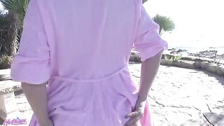 A public park scene with a relaxing woman who squirts and masturbates