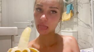 Girl masturbates with a banana, imitating porn stars in hot scenes