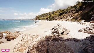 A couple enjoys a romantic and passionate sex on the nude beach during their vacation