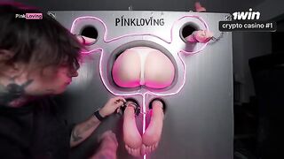 The girl is handcuffed and fucked through a glory hole in a steamy scene