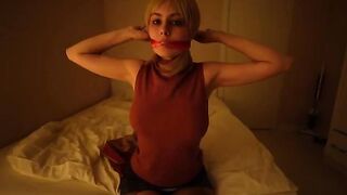 A girl dressed as a Resident Evil character pleads for deep throat