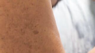 A woman reaches orgasm with her own fingers in an intense solo session