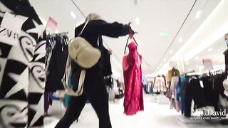A chick was almost caught while sucking a dick in the fitting room